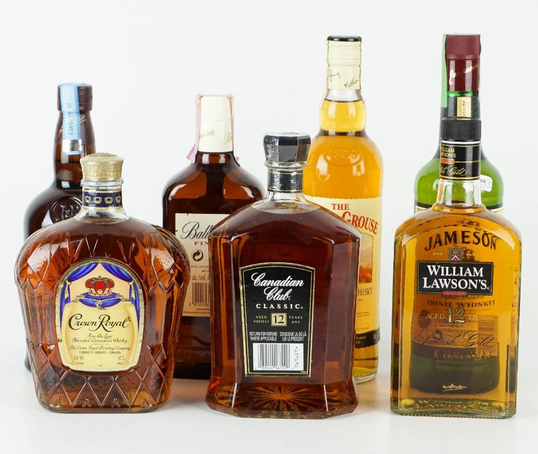 7 Garrafas de Whisky